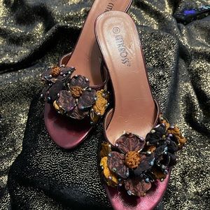 A deep rouge (red) mule.